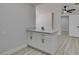 Kitchen island features storage and countertop seating at 1825 Howard Ave, Las Vegas, NV 89104
