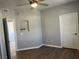 Bright main bedroom featuring dark floors, neutral walls, and decorative shelving at 1830 N Buffalo Dr # 2022, Las Vegas, NV 89128