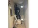 Small utility room holding a water heater and electrical panel at 1830 N Buffalo Dr # 2022, Las Vegas, NV 89128