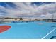 A basketball court is available for residents, with bleachers, hoops, and marked playing lines at 1952 W Hammer Ln, North Las Vegas, NV 89031