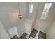Entryway with high ceilings and a staircase leading to the upper level at 1952 W Hammer Ln, North Las Vegas, NV 89031