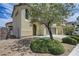 Inviting home featuring desert-friendly landscaping, an attached garage, and an appealing facade at 1952 W Hammer Ln, North Las Vegas, NV 89031