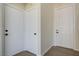 Hallway featuring two closets and the front door at 1952 W Hammer Ln, North Las Vegas, NV 89031