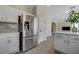 Modern kitchen with stainless steel refrigerator and sleek countertops at 1952 W Hammer Ln, North Las Vegas, NV 89031