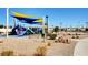 Community playground with colorful shade structures, providing a fun and safe environment for children at 1952 W Hammer Ln, North Las Vegas, NV 89031
