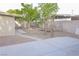 Backyard featuring patio, mature trees, desert landscaping and a block wall at 2001 E Mcwilliams Ave, Las Vegas, NV 89101