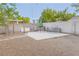 Backyard with mature trees and desert landscaping and brick outdoor kitchen at 2001 E Mcwilliams Ave, Las Vegas, NV 89101