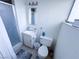 Bathroom including a sink, a shower with glass doors, and a white toilet at 2001 E Mcwilliams Ave, Las Vegas, NV 89101