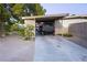 View of carport featuring covered parking and desert landscaping at 2001 E Mcwilliams Ave, Las Vegas, NV 89101