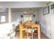Dining area with wooden table, chairs, and decorative lighting, creating a cozy ambiance at 2001 E Mcwilliams Ave, Las Vegas, NV 89101