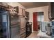 A spacious kitchen featuring black appliances and functional cabinetry at 2001 E Mcwilliams Ave, Las Vegas, NV 89101