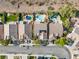 Aerial view showing multiple homes with pools, patios, and lush landscaping at 2158 Shubert Ave, Henderson, NV 89052