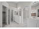 Bright primary bathroom with double sinks and separate toilet room at 2158 Shubert Ave, Henderson, NV 89052