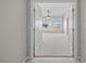 Bright bedroom boasts large windows offering scenic views and a ceiling fan at 2158 Shubert Ave, Henderson, NV 89052