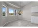 Cozy dining area featuring tile flooring, with natural light and backyard views at 2158 Shubert Ave, Henderson, NV 89052