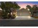 Charming single-Gathering home featuring a two-car garage, and a well manicured lawn at 2158 Shubert Ave, Henderson, NV 89052