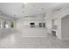 Living area showing the connection to the kitchen space with stainless appliances at 2158 Shubert Ave, Henderson, NV 89052