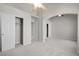 Spacious main bedroom with carpet, dual closets, ceiling fan and arched entryways at 2158 Shubert Ave, Henderson, NV 89052