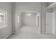Bright main bedroom with arched entryway, plush carpet and scenic views at 2158 Shubert Ave, Henderson, NV 89052