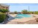 Sparkling in-ground pool with attached spa and desert landscaping at 2158 Shubert Ave, Henderson, NV 89052