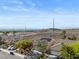 Street view of homes, showcasing well-manicured yards and desert landscaping at 2158 Shubert Ave, Henderson, NV 89052