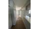 Hallway with tiled flooring provides transition between living spaces and the back patio at 227 N Lamb Blvd # A, Las Vegas, NV 89110
