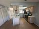 Functional kitchen featuring tiled floors, countertops, and stainless steel appliances at 227 N Lamb Blvd # A, Las Vegas, NV 89110