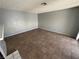 Neutral living room with tile flooring, and awaiting your personal touch at 227 N Lamb Blvd # A, Las Vegas, NV 89110