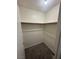 Walk-in closet with carpeting and ample space for storing clothes and accessories at 227 N Lamb Blvd # A, Las Vegas, NV 89110