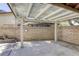 Backyard patio area with a covered structure and brick wall at 2349 Wooster Cir # A, Las Vegas, NV 89108