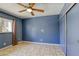 Bedroom featuring tiled floors, a ceiling fan and a closet at 2349 Wooster Cir # A, Las Vegas, NV 89108
