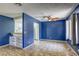 Dining area featuring tile flooring, a ceiling fan, and open access to the kitchen at 2349 Wooster Cir # A, Las Vegas, NV 89108