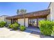Community clubhouse entrance featuring double glass doors and well-maintained landscaping at 2349 Wooster Cir # A, Las Vegas, NV 89108