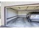 Attached garage with a vehicle parked inside, providing secure and convenient parking at 2349 Wooster Cir # A, Las Vegas, NV 89108