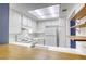 Bright kitchen featuring white appliances, subway tile backsplash, and ample cabinet space at 2349 Wooster Cir # A, Las Vegas, NV 89108