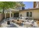 Outdoor patio area offering ample seating space, a pergola, and views of the backyard at 2349 Wooster Cir # A, Las Vegas, NV 89108
