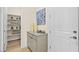 Stylish entryway featuring a built-in cabinet and access to a pantry at 243 Paraggi Bay Dr, Henderson, NV 89011