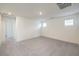 Spacious bedroom with carpeted floors and natural light at 2637 Begonia Falls Ave # 87, North Las Vegas, NV 89081