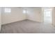 Large bedroom with carpeted floors and natural light at 2637 Begonia Falls Ave # 87, North Las Vegas, NV 89081