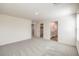 Open-layout primary bedroom features soft carpet with an ensuite bath and walk-in closet enhancing comfort and convenience at 2637 Begonia Falls Ave # 87, North Las Vegas, NV 89081