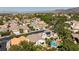Bird's-eye view of a community showcasing well-maintained homes, mature trees, and neighborhood streets at 270 New River Cir, Henderson, NV 89052
