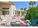 Spacious backyard with a covered patio and meticulously maintained landscaping at 270 New River Cir, Henderson, NV 89052