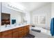 This bathroom features a tub and a large vanity at 270 New River Cir, Henderson, NV 89052