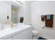 Bright bathroom featuring a vanity with framed mirror, and decorative towels at 270 New River Cir, Henderson, NV 89052