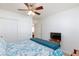 Bedroom with a ceiling fan, closet, and tv provides a neat space at 270 New River Cir, Henderson, NV 89052