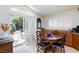 Bright dining area with backyard access, and granite counters, great for entertaining at 270 New River Cir, Henderson, NV 89052