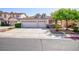 Charming single-story home featuring a two-car garage and well-manicured landscaping at 270 New River Cir, Henderson, NV 89052