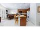 Eat-in kitchen boasts modern appliances, granite counters, breakfast bar, and bright natural light at 270 New River Cir, Henderson, NV 89052