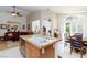 Open concept kitchen with granite counters, stainless steel appliances, and eat-in kitchen at 270 New River Cir, Henderson, NV 89052