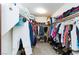 This walk in closet is full of clothes and shoes at 270 New River Cir, Henderson, NV 89052